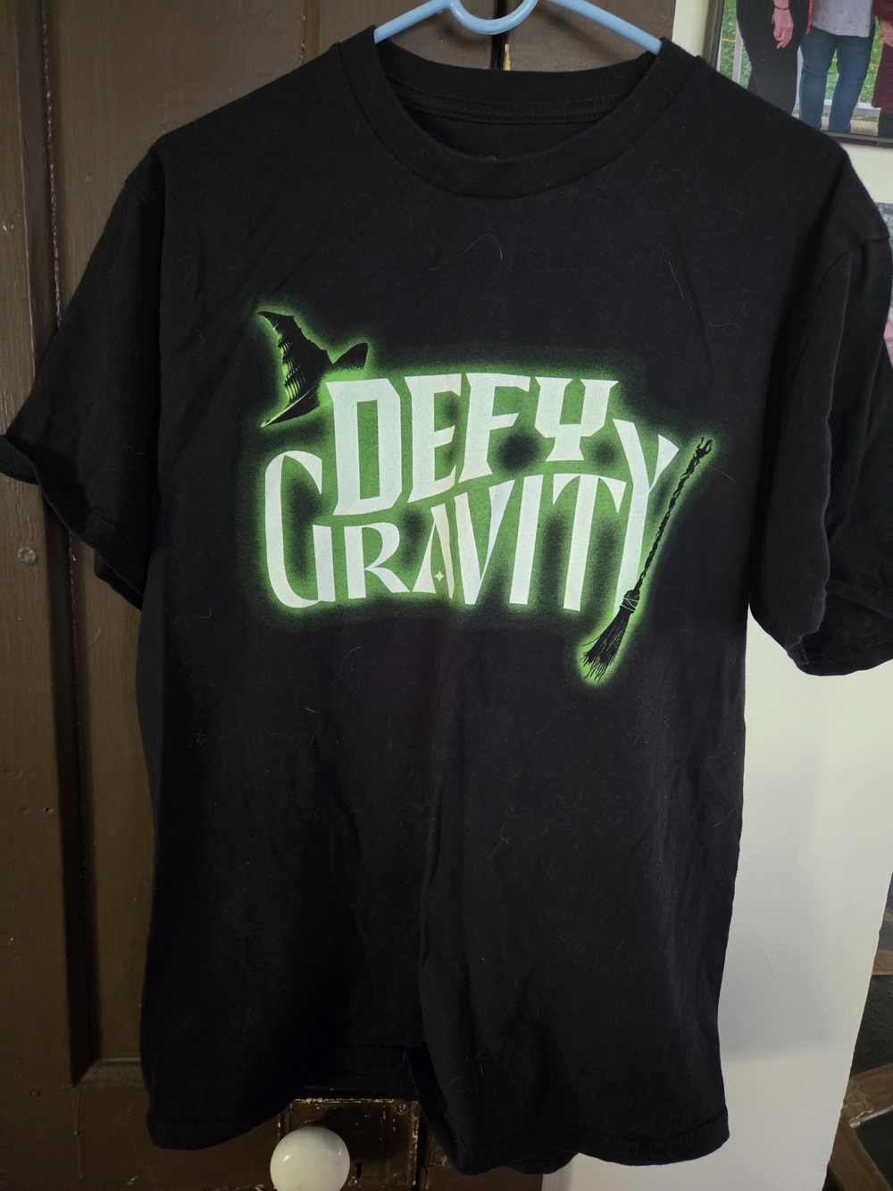 Hot Topic Black T‑Shirt with Neon Green 'Defy Gravity' Graphic